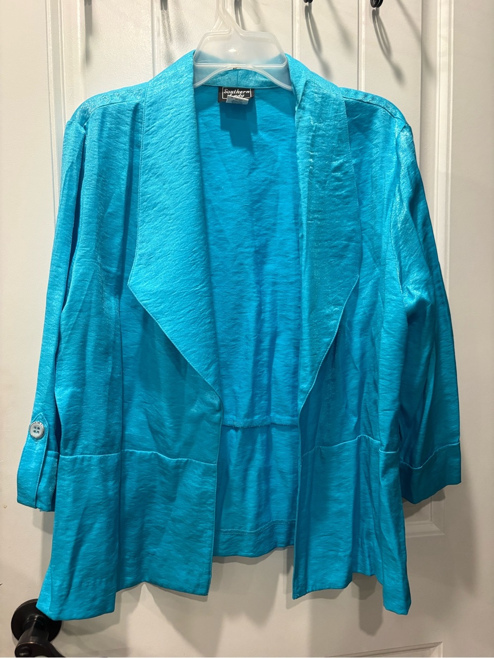 open-front turquoise blazer jacket by the clothing brand Southern Lady size 12